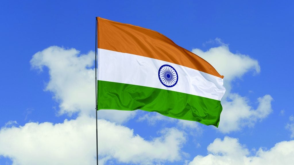 3d illustration flag of India. India flag isolated on the blue sky.