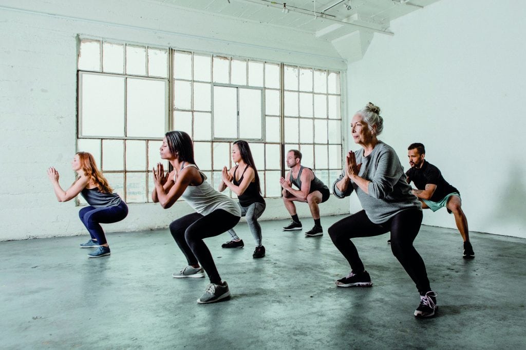 Diverse people in a yoga class